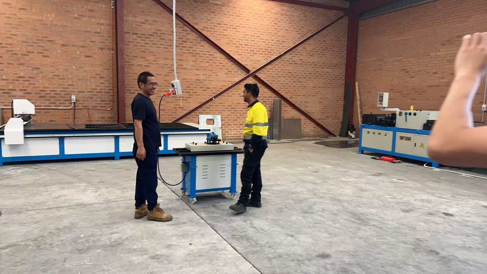 Airtemp staff at the new plasma cutting table