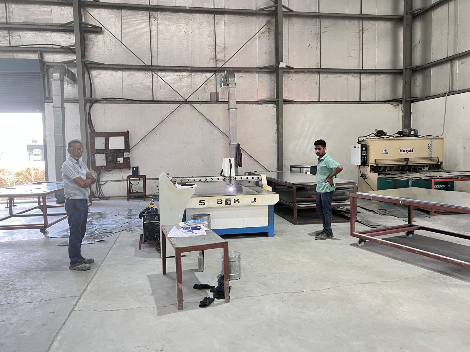 CNC plasma cutting table in production at an Indian fabrication shop